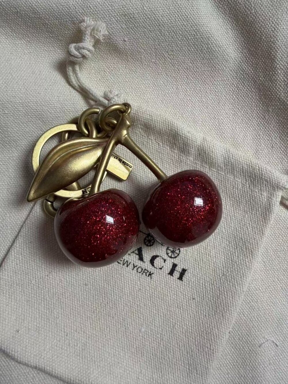 Coach Glitter Cherry Key Charm in Red withGold Hardware